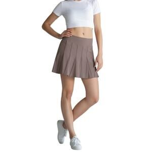 ATHLETA Wear About Pleated Skort Sz 10 Tan Golf Tennis Performance Versatile EUC